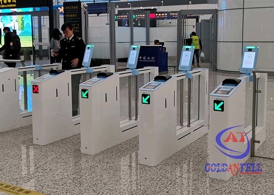 il contro mezzo cancello girevole del controllo di accesso dell'ospite e della selezione della temperatura rispecchia il portone dell'aeroporto del riconoscimento di fronte del portone